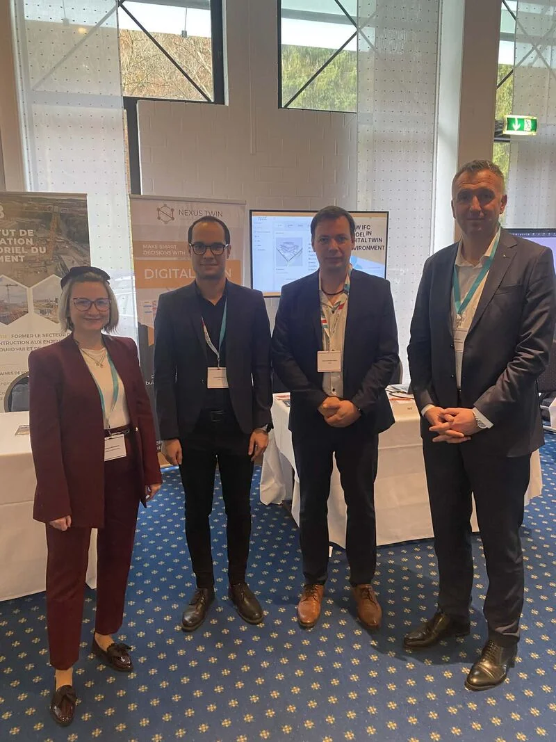 Group photo at the Nexus Twin stand during BIM Lux 2025 in Luxembourg